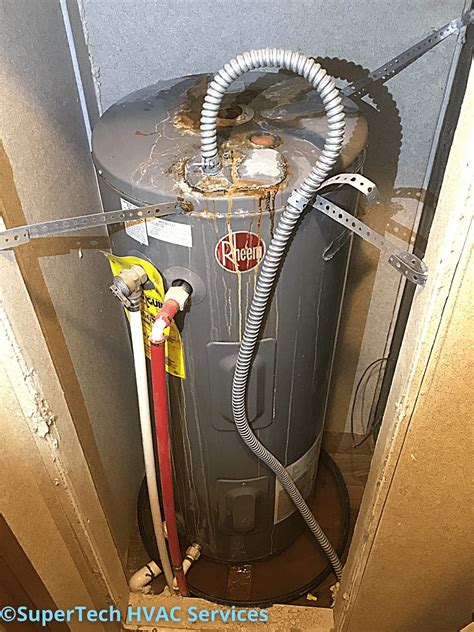 hot water heater leaking from side panel|Water Heater Leaking from Pipe on Side: Causes, Solutions, and ...